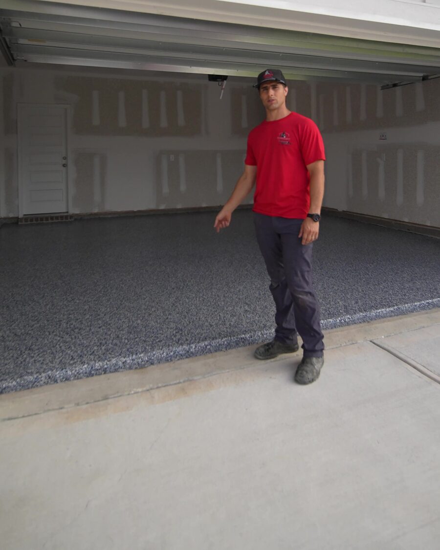 Completed flake garage floor running edge to edge in a two-car garage