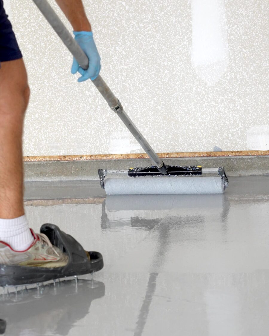 Rolling clear coat across a glass-wet floor
